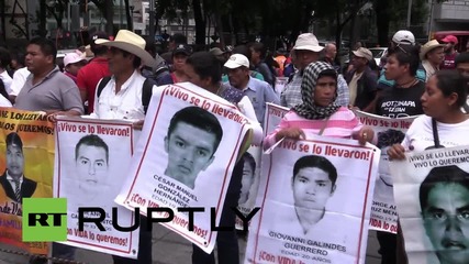 Mexico: Thousands march demanding answers over Iguala kidnapping