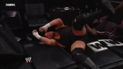 Mark Henry smashes Big Show on the barricade