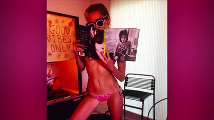 Miley Cyrus Flaunts her HOT Bikini Body in Skimpy Suit