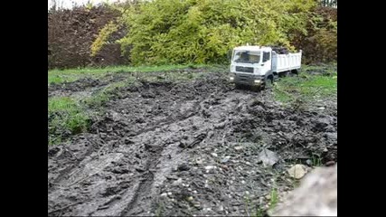 Man Tga 6x6 dump truck in rough terrain 