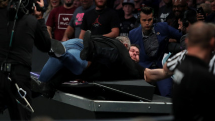 Shane McMahon attacks Kevin Owens