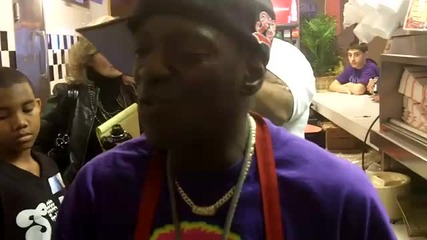 Flavor Flav Teaching How to Fry Great Chicken At His New Fried Chicken Restaurant In Iowa! 