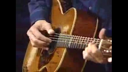 Tommy Emmanuel - Somewhere Over The Rainbo