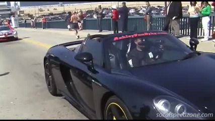 Two Porsche Cgts doing burnouts