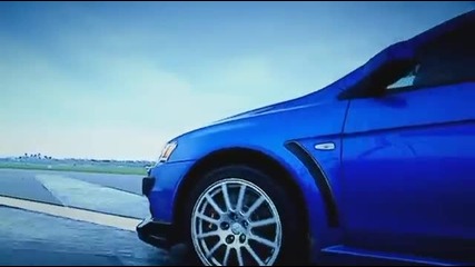 Top Gear_ Mitsubishi Lancer Evo X vs Subaru Impreza Wrx Sti
