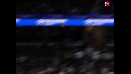 Lebron James underhanded half court shot