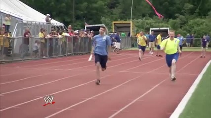 Big Show and The Bella Twins participate in the 2013 Special Olympics Connecticut Summer Games
