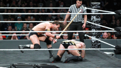 Adam Cole whips Aleister Black with a Kendo stick in the stomach: NXT TakeOver: Philadelphia (WWE Network Exclusive)