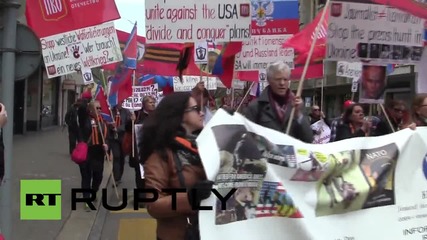 Про-Донбас протестиращи изрисуваха улиците на Цюрих в бяло, жълто и червено