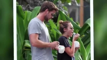 Miley Cyrus Liam Hemsworth spending time on the beach in Hawaii