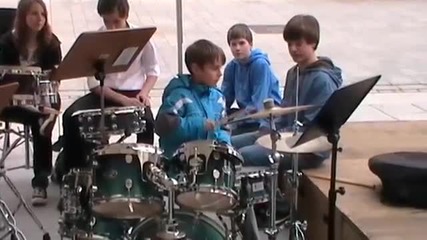 Young boy first drumming