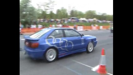 Audi S2 Coupe Vs. Opel Astra Drag Race