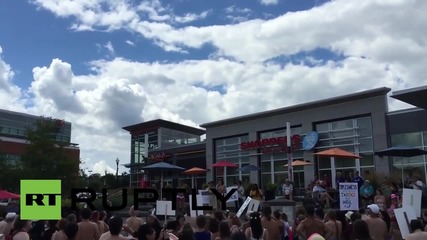 Canada: Topless protesters defend women's right to bare breasts *EXPLICIT*