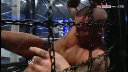Mark Henry throwing Orton through one of the pods