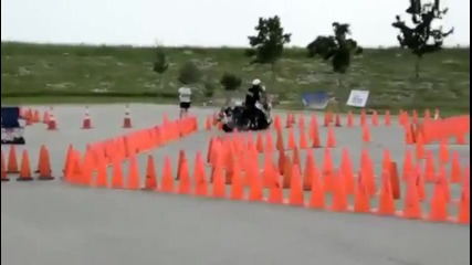 Police Officer Tears Up The Course At The Motorcycle Rodeo - Funny Videos at Videobash