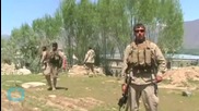 Afghan Forces Struggle to Drive Back Taliban From Besieged City