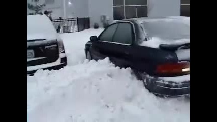 Subaru Vs. snow pile