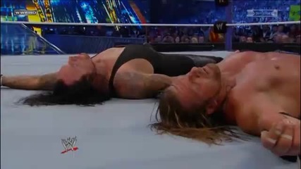 Triple H Ddts Undertaker into a chair