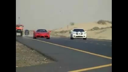 Mercedes Slk with Slr engine races Ferrari Enzo 