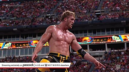 Logan Paul goes sky-high for a frog splash onto The Miz through the announce table: SummerSlam 2022 (WWE Network Exclusive)