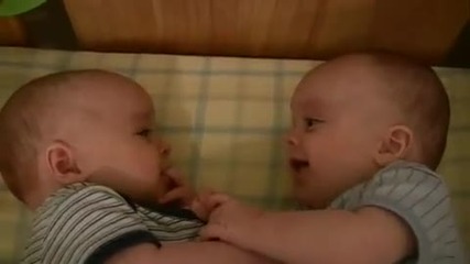 Twin Baby Boys Laughing at Each Other