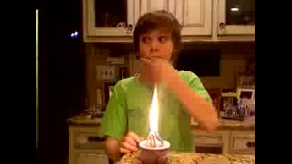 Christian Beadles Blowing Out a Candle / Christian Beadles