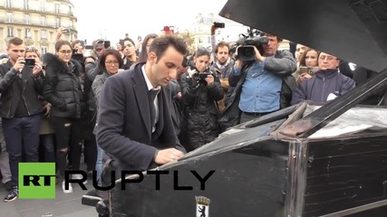 France: Pianist plays John Lennon's 'Imagine' as mourners gather on Place de la Republique