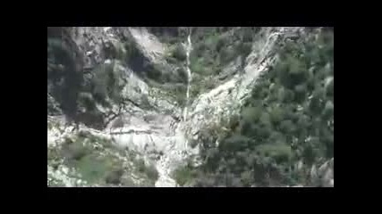 Red Bull BASE jumper pulls at 100ft in the Alps