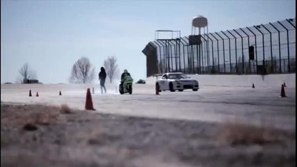 Motorcycle Vs. Car Drift Battle - Funny Videos at Videobash