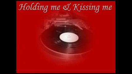 Holding Me Kissing Me