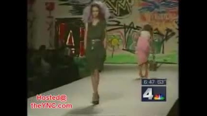 News reader cannot stop laughing at model falling over! 