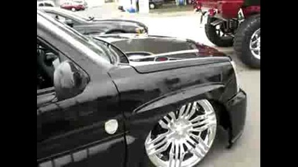Slammed Cadillac Escalade And Lifted Hummer H2