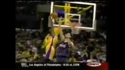 Kobe Bryant dunks over Yao Ming