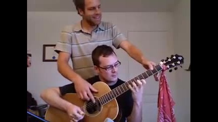 Изпълнение на четири ръце на китара 