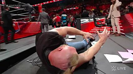 Bobby Lashley puts Brock Lesnar through a table