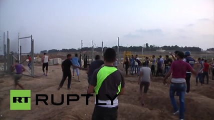 State of Palestine: Clashes erupt as Palestinian protesters break through Israeli border fence