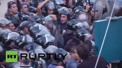 Lebanon: Water cannons, rubber bullets fired in Beirut waste protests