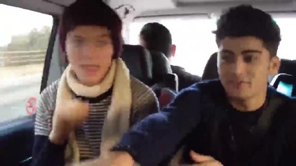 Zayn Malik and Louis Tomlinson dancing in the car