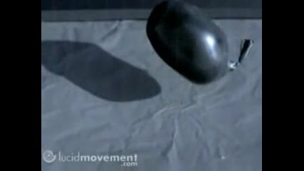 Slow - Mo Of A Water Balloon Falling Fla