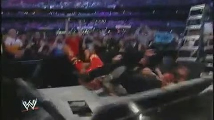 Vince Mcmahon does a Leg Drop off a Ladder through the Announcer Table