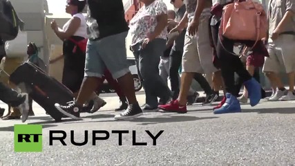 USA: Artists Janelle Monae & Jidenna lead Black Lives Matter protest on Hollywood Walk of Fame