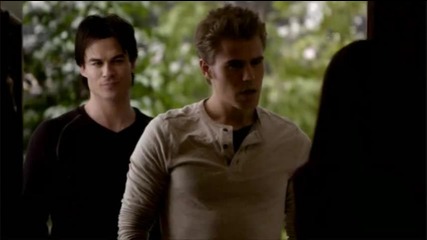 Damon, Elena and Stefan talk in the kitchen