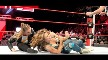 Ronda Rousey locks Mickie James in an armbar during the main event: Raw, April 23, 2018