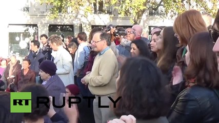 France: Lennon's classics sang in Republic Square as mourning continues