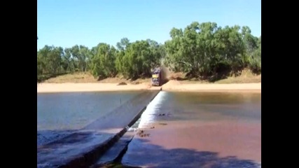 Road_train_going_flat-out_over_a