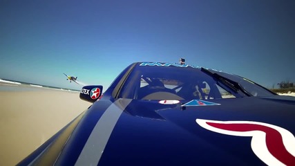 V8 Supercar vs. Airplane race on an Australian beach