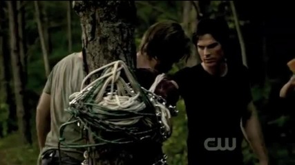 Damon, Elena and Alaric tie Ray to a tree