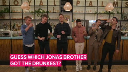 The Jonas Brothers get wasted playing drinking games with Seth Meyers