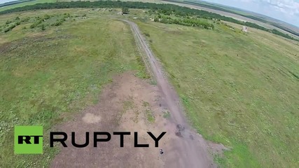 Ukraine: Drone captures MH17 crash site memorial one year on