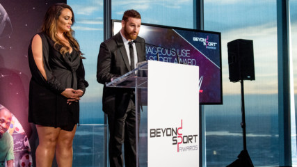 Sami Zayn and Nia Jax present the Courageous Use of Sport Award at the Beyond Sport Global Awards